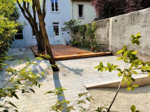 Terrasse bois et pavé béton